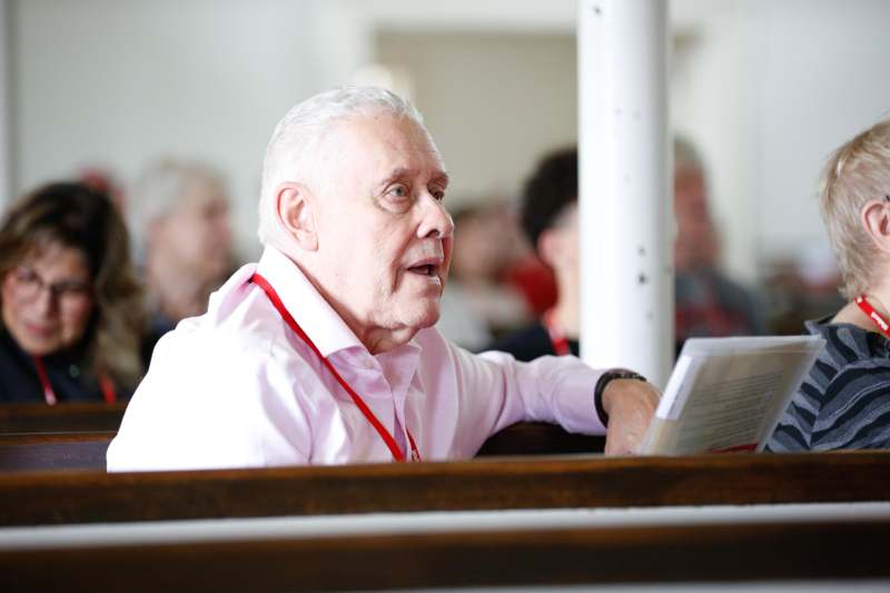 a man sitting in a church