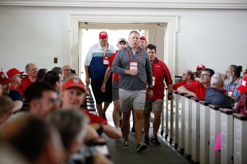 a group of people in a hallway
