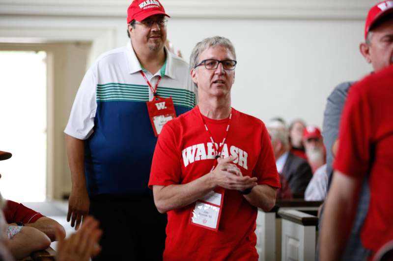 a man in a red shirt