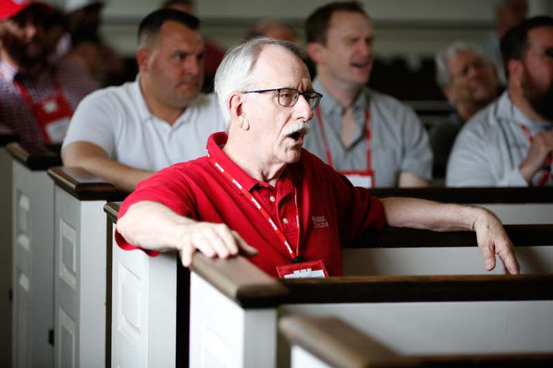 a man in a red shirt