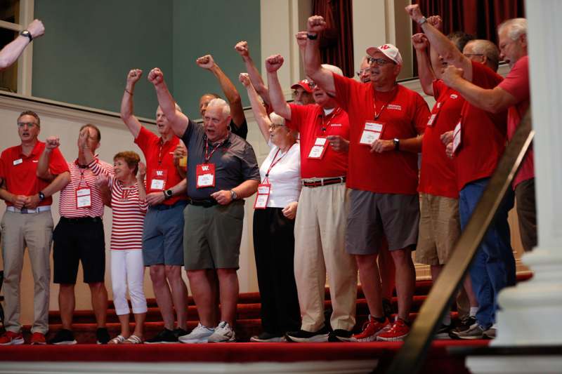 a group of people raising their fists