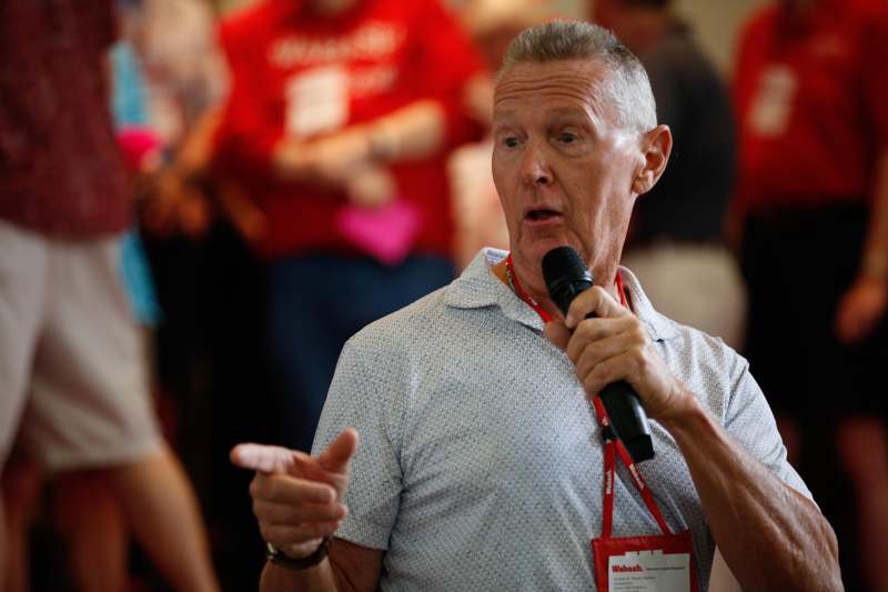 a man holding a microphone