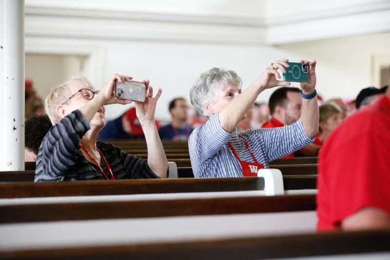 a group of people taking a picture of themselves