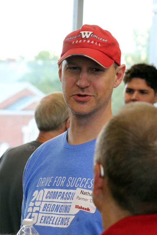 a man wearing a red hat