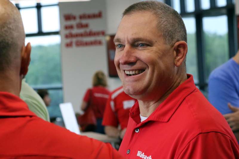 a man in a red shirt