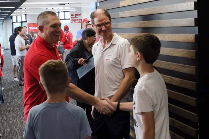 a group of people shaking hands