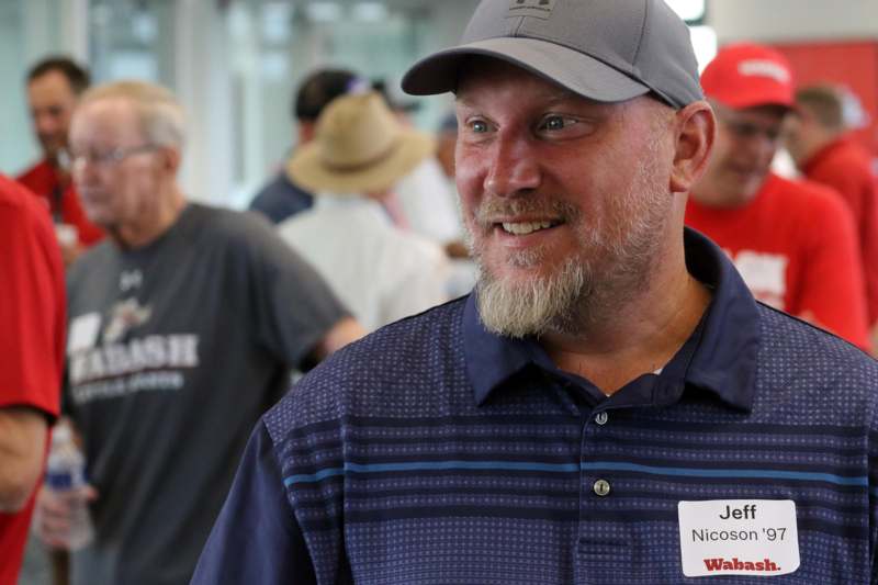 a man wearing a hat and badge