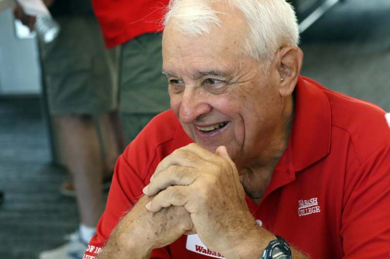 a man in a red shirt