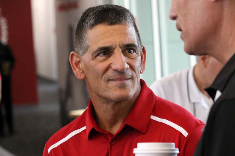 a man in a red shirt