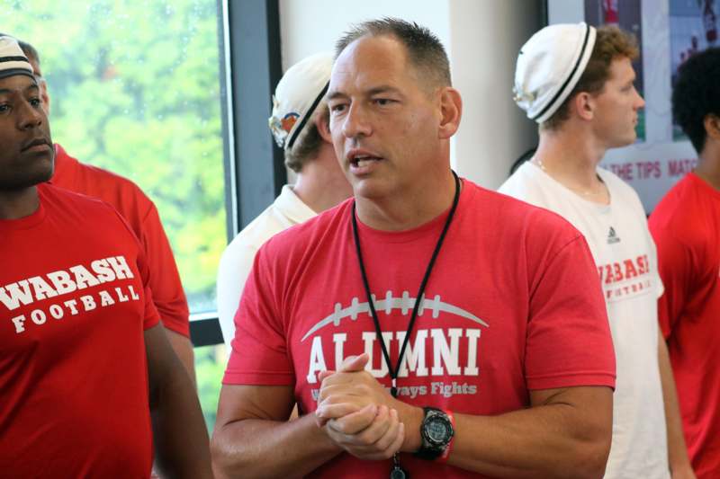 a man in a red shirt