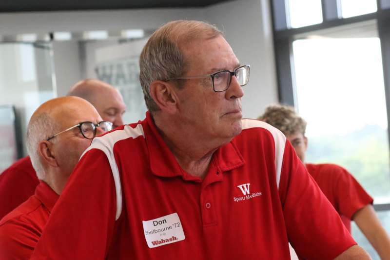 a man in a red shirt