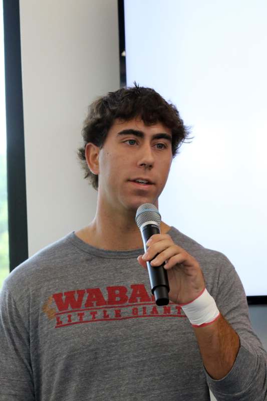 a man holding a microphone