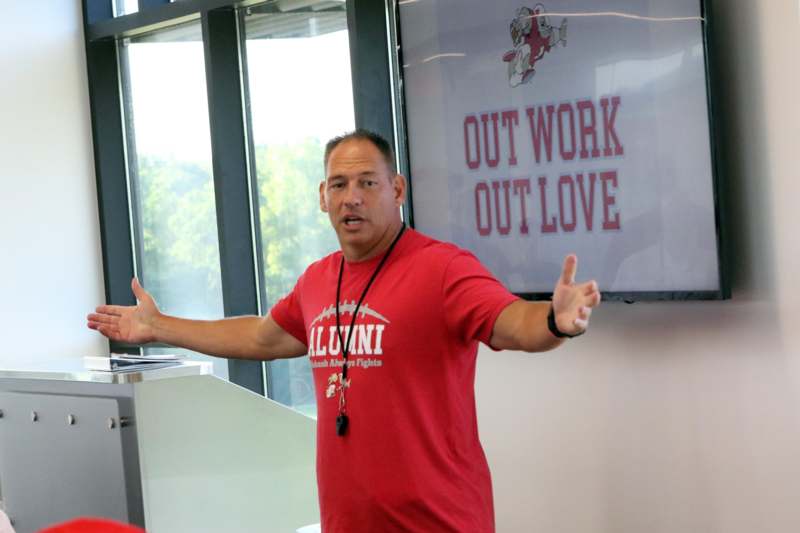a man in a red shirt