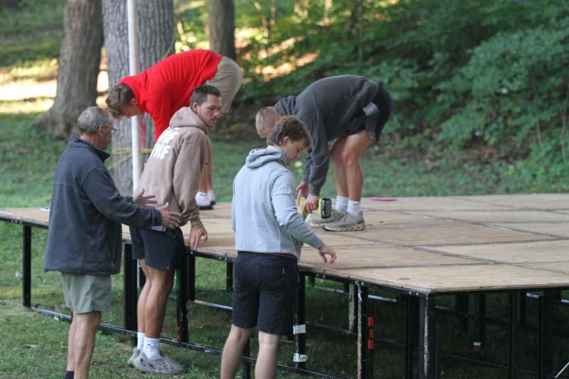 a group of people standing on a stage