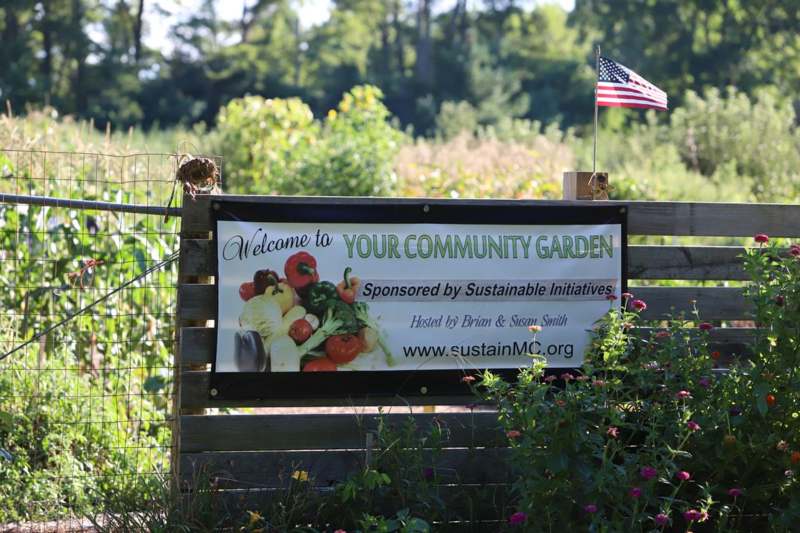 a sign in a garden