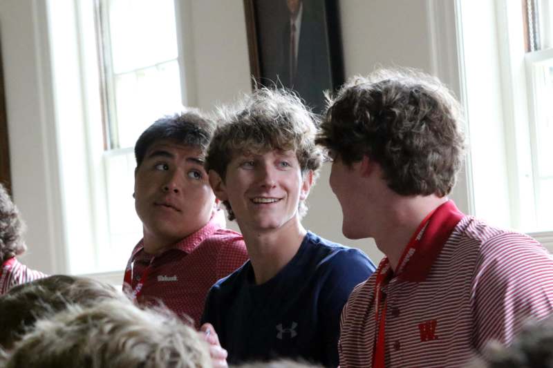 a group of men looking at each other