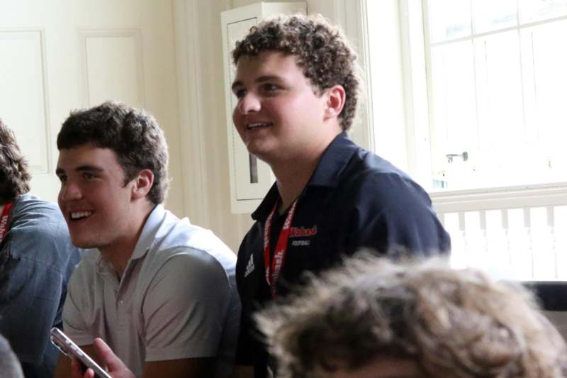 a group of people sitting in a room