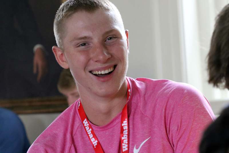 a man smiling at camera