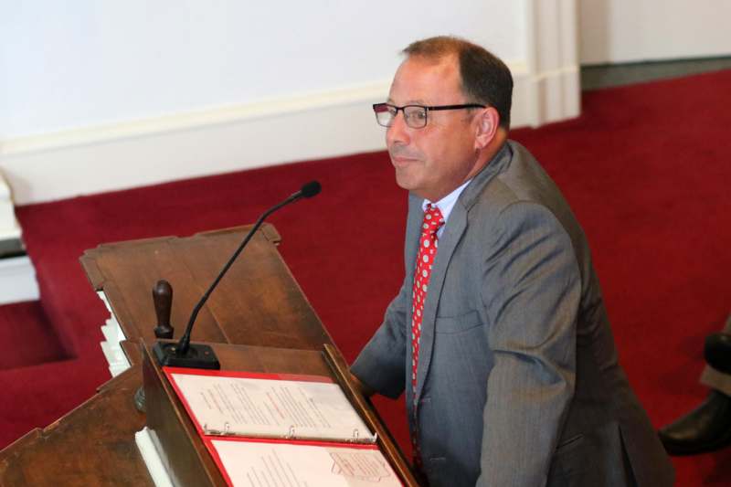 a man standing at a podium