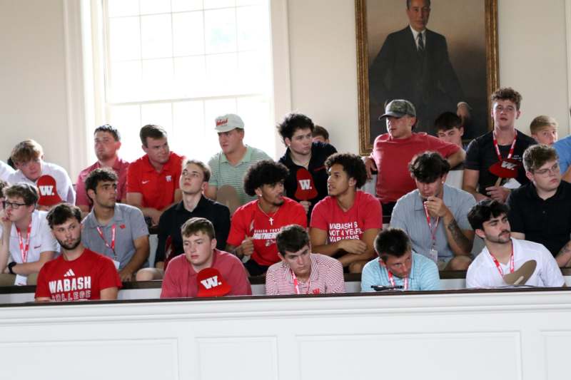 a group of people sitting in a room