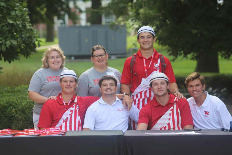 a group of people posing for a photo