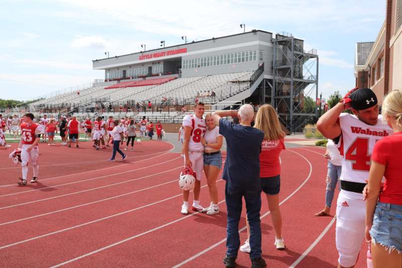 a group of people on a track