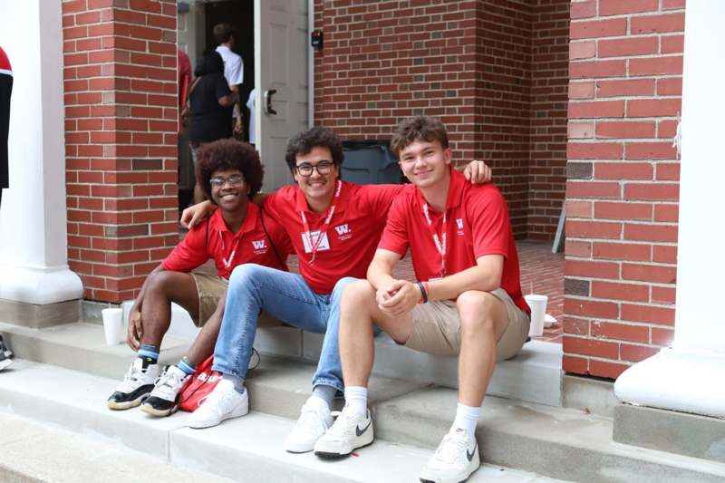 a group of people sitting on steps