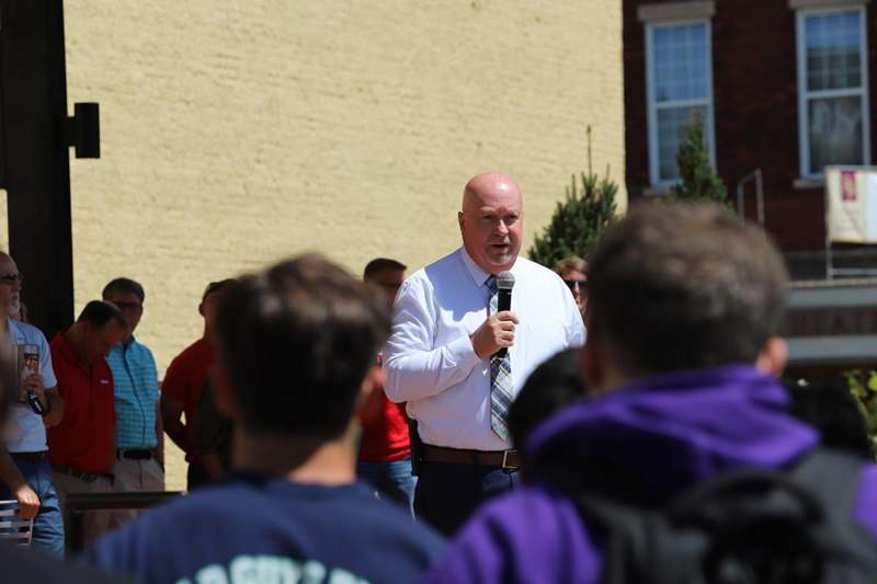 a man speaking into a microphone