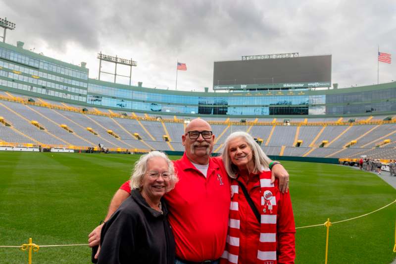 a group of people standing in a stadium