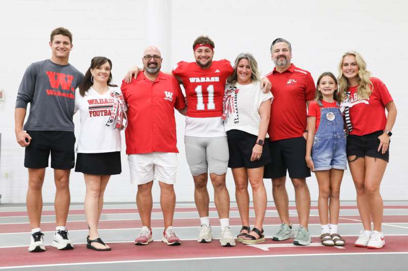 a group of people posing for a photo