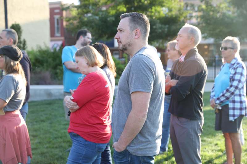a group of people standing in a line