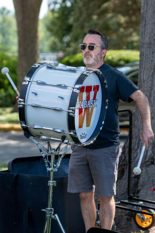 a man playing a drum