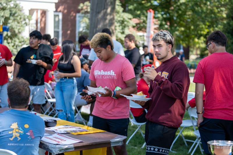a group of people eating outside