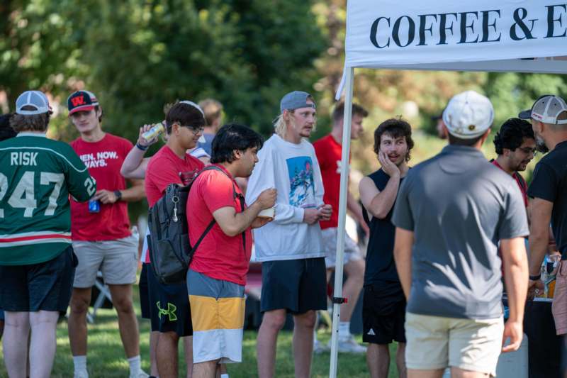 a group of people standing in a line