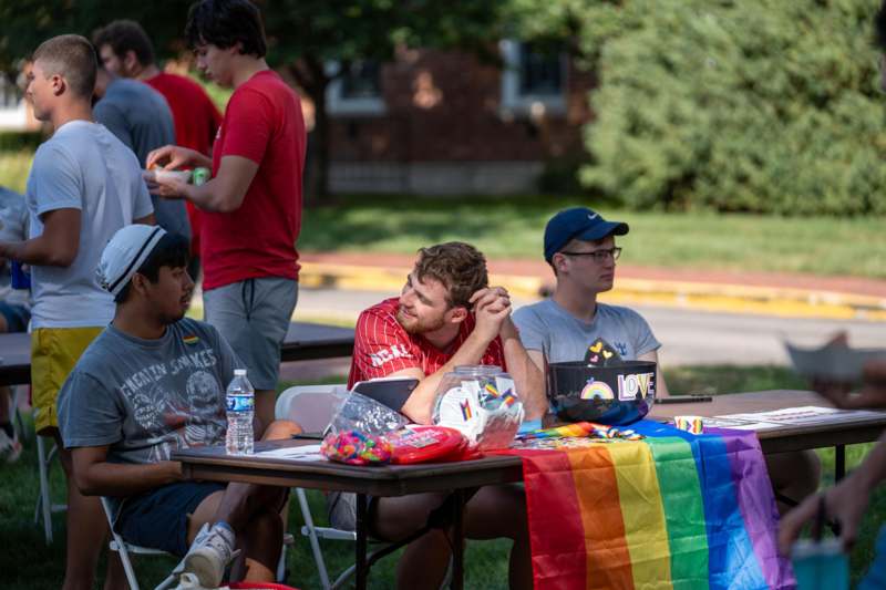 a group of people sitting at a table