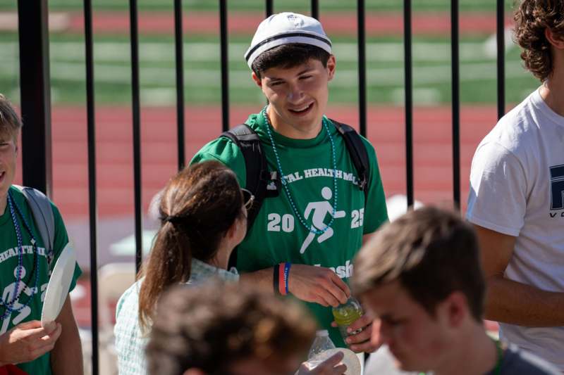 a man in a green shirt