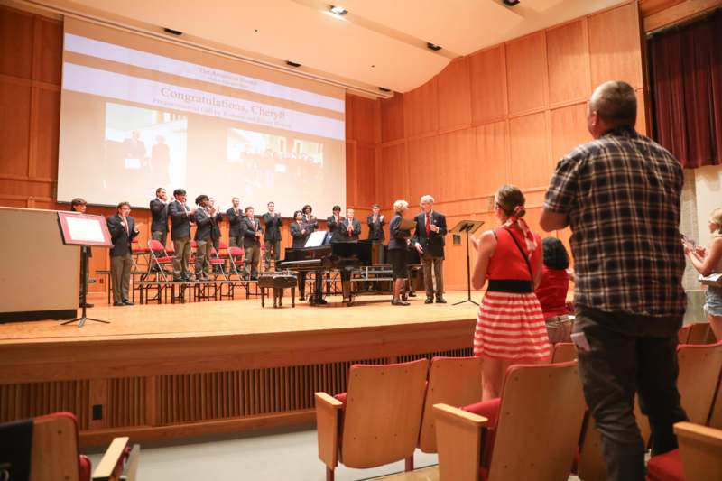 a group of people on a stage