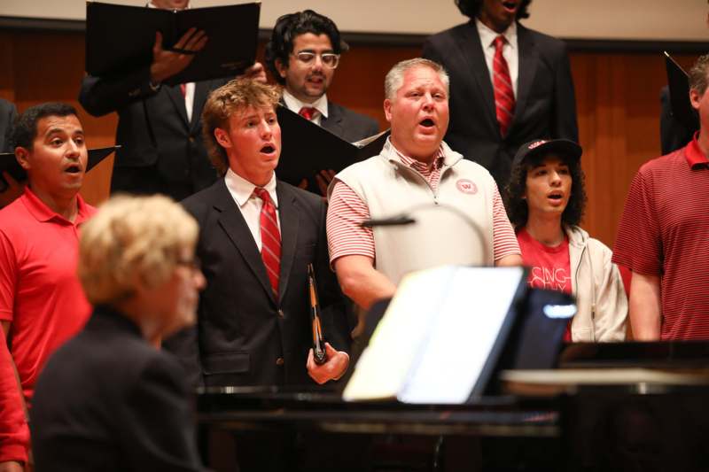 a group of people singing