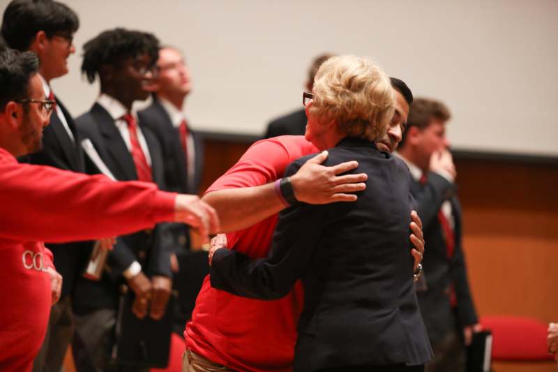 a group of people hugging