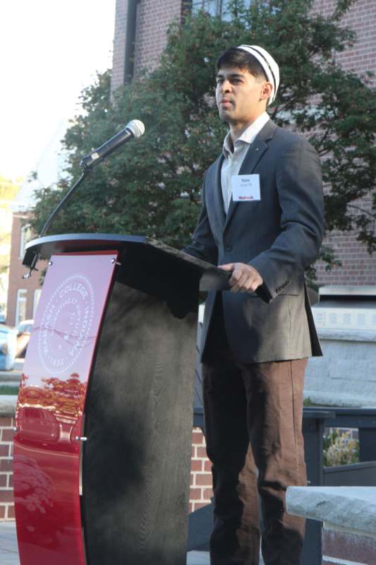 Phi Gamma Delta Celebration of Philanthropy and Ribbon Cutting - a man standing at a podium