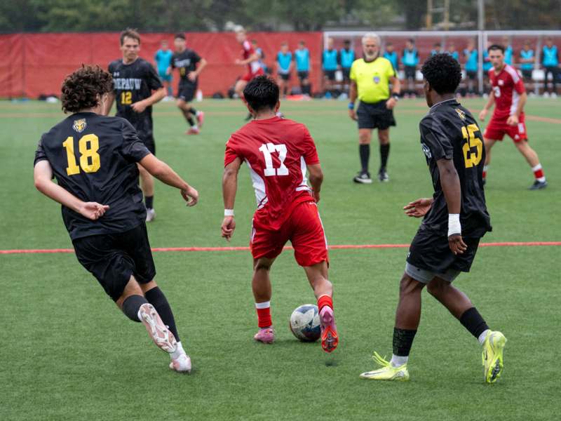 a group of men playing football