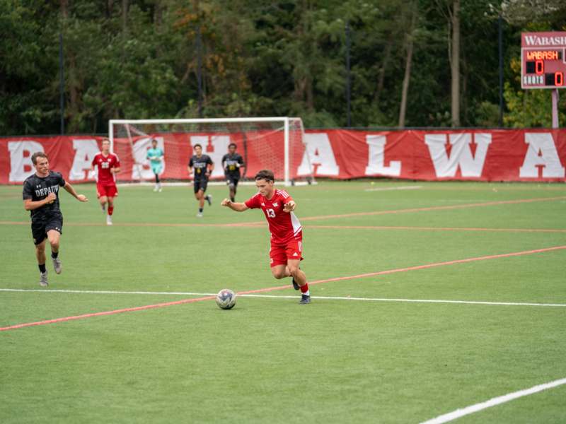 a group of people playing football