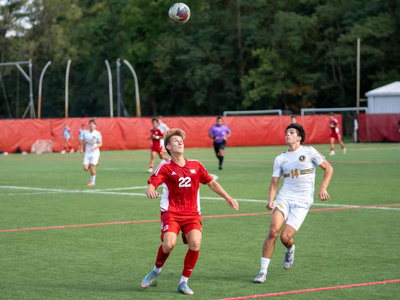 a group of men playing football