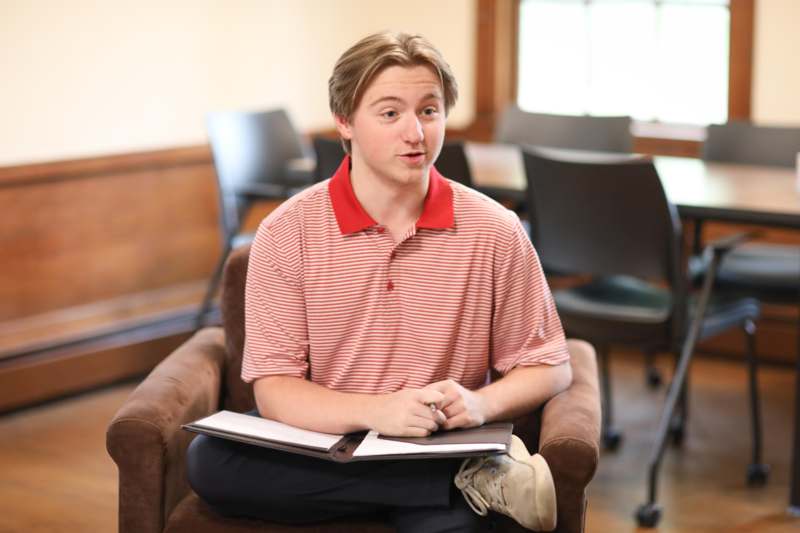 a man sitting in a chair