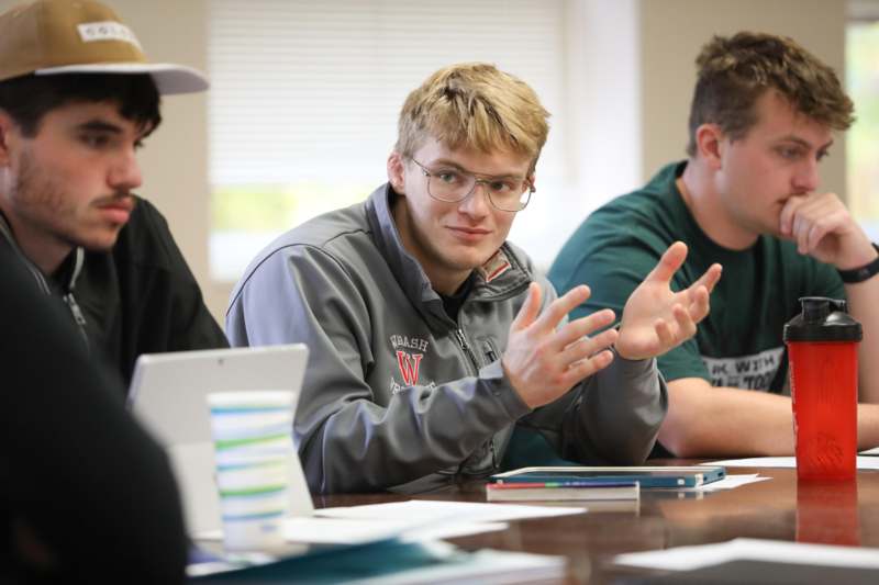 a group of people sitting at a table