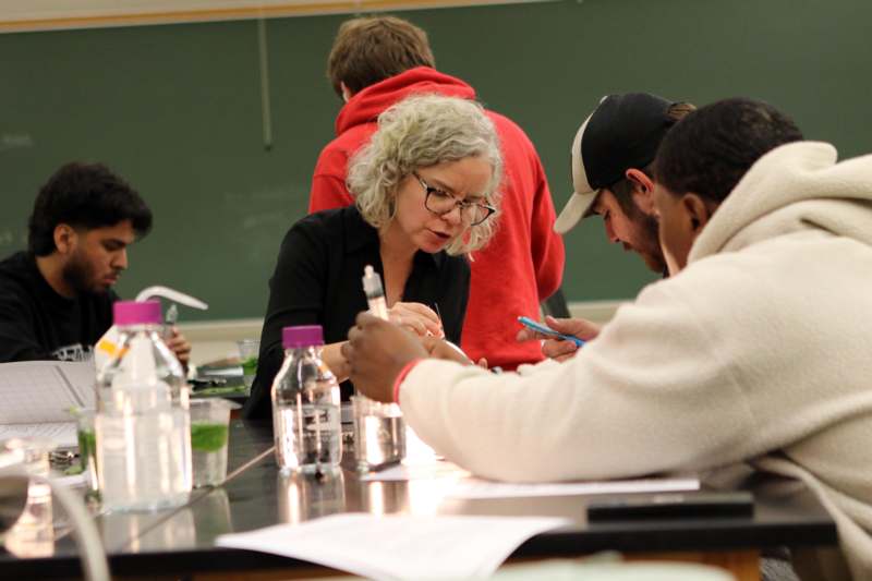 a group of people sitting at a table