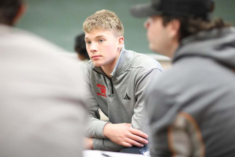 a man sitting in a circle
