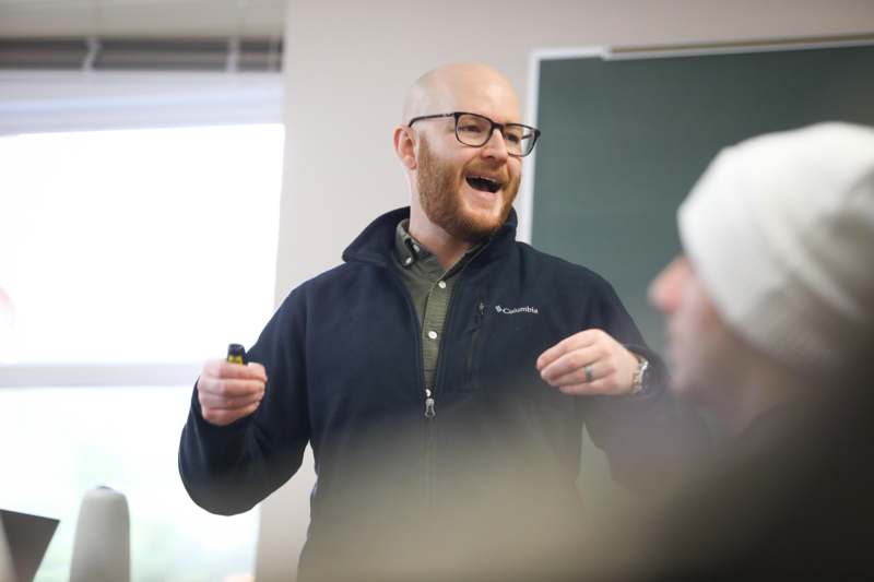 a man in glasses with his mouth open