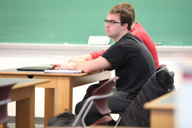 a man sitting at a desk