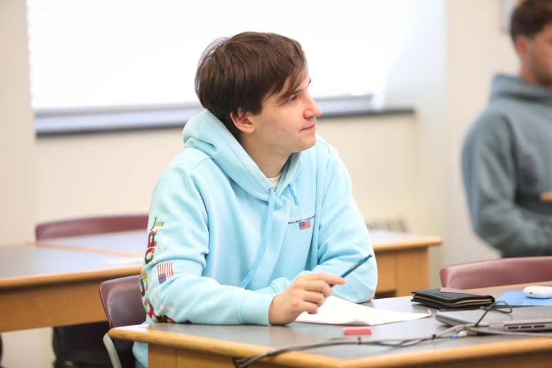 a man sitting at a desk